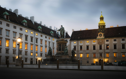 A statue is in front of a building at dusk from Chrome web store to be run with OffiDocs Chromium online A statue is in front of a building at dusk from Chrome web store to be run with OffiDocs Chromium online