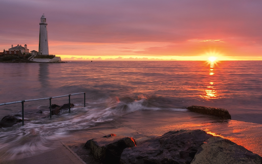 Lighthouse with sun on the sea from Chrome web store to be run with OffiDocs Chromium online Lighthouse with sun on the sea from Chrome web store to be run with OffiDocs Chromium online